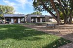 Zion`s Camp and Cottages has 4 Cottages and 24 bunkhouses if you need less.